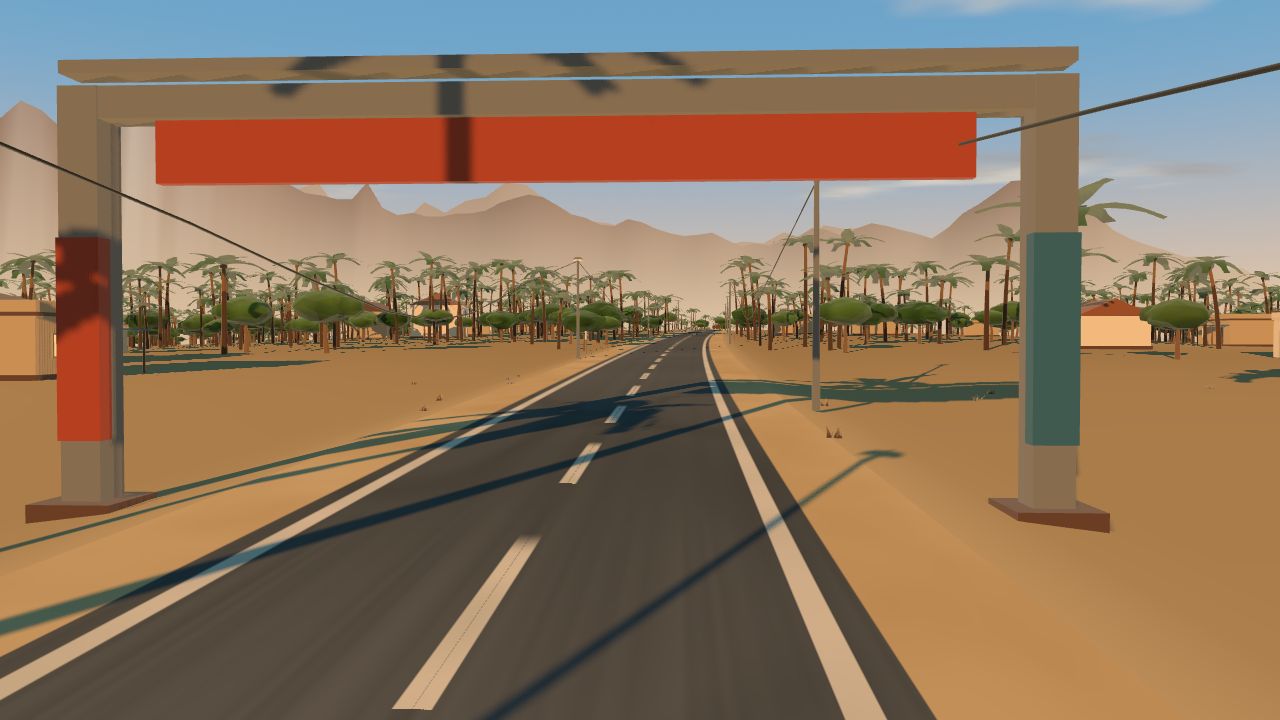 Riding under the finish gantry of a desert course in OpenCycle