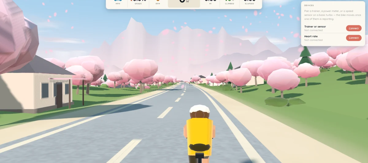 The ride HUD showing power, speed, cadence, gradient, distance, climbed and elapsed time